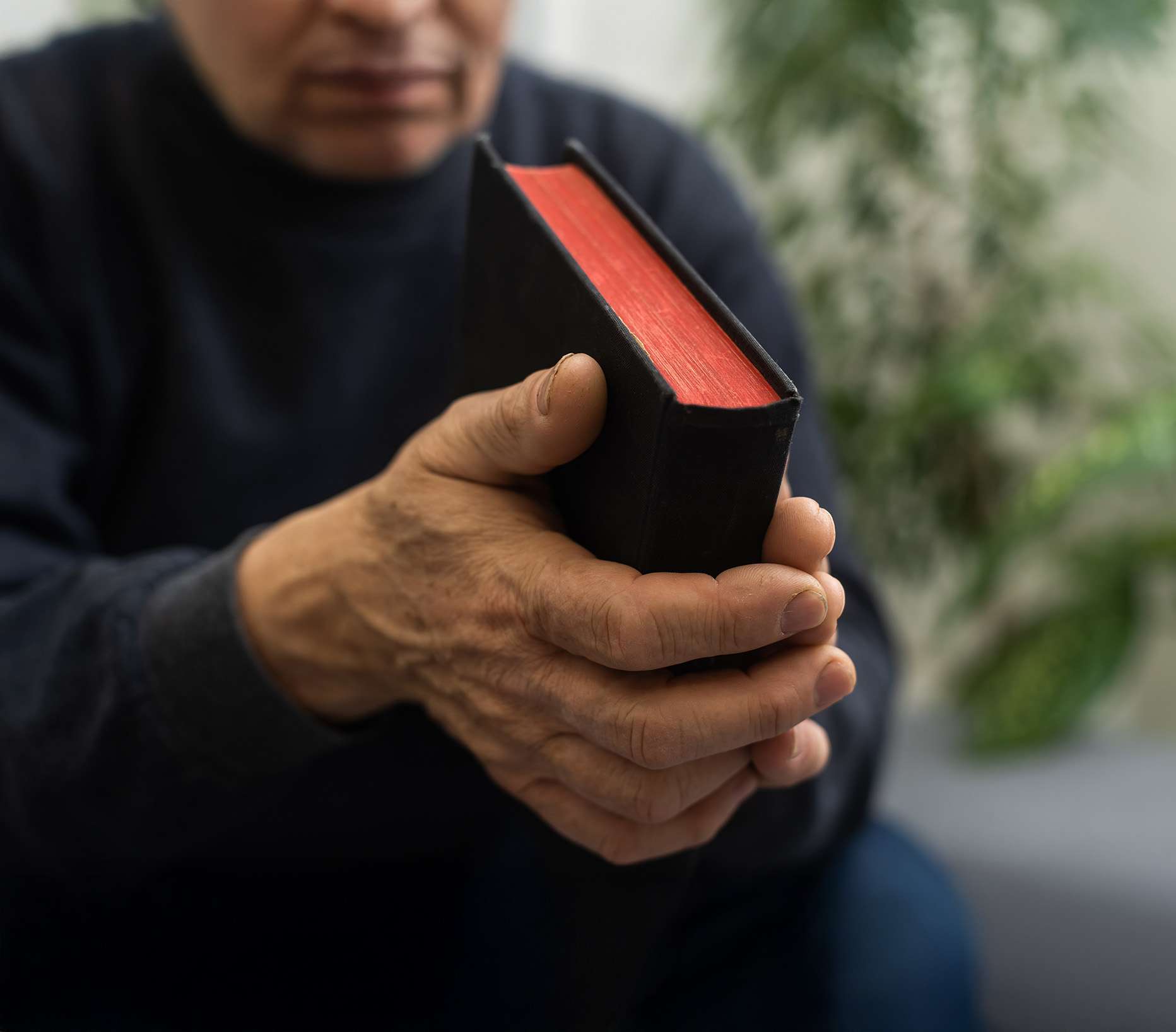 man holding bible